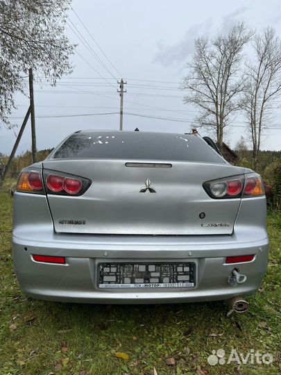 Крышка багажника lancer 10