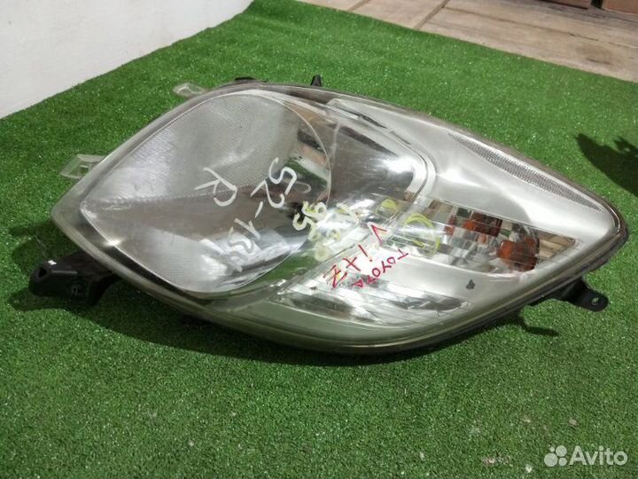 Фара галогеновая левая Toyota Vitz NCP95