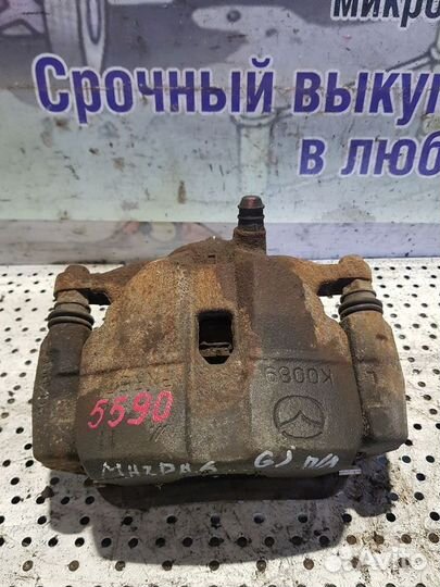 Суппорт тормозной передний левый Mazda 6