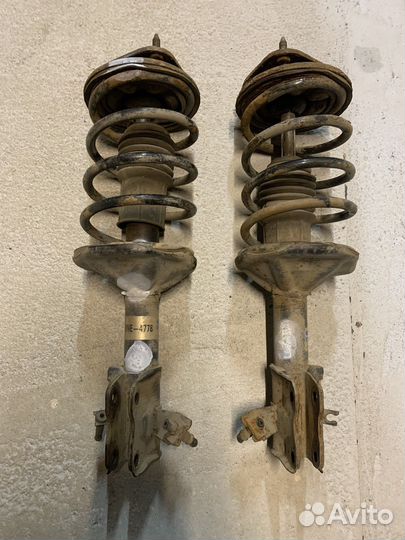 Стойка передняя правая Mitsubishi Lancer 7