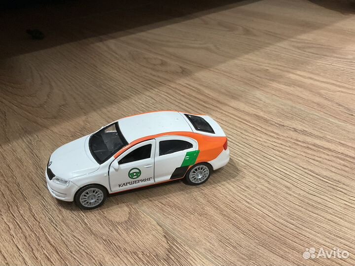Автомобиль каршеринг Skoda Rapid игрушка