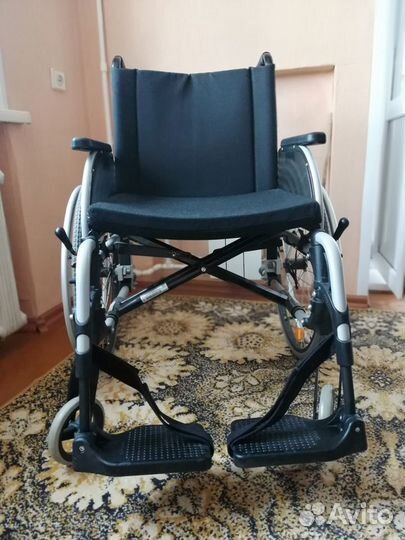 Инвалидное кресло