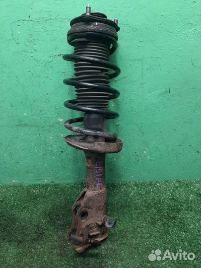 Стойка амортизатора передняя левая Honda Civic 4D