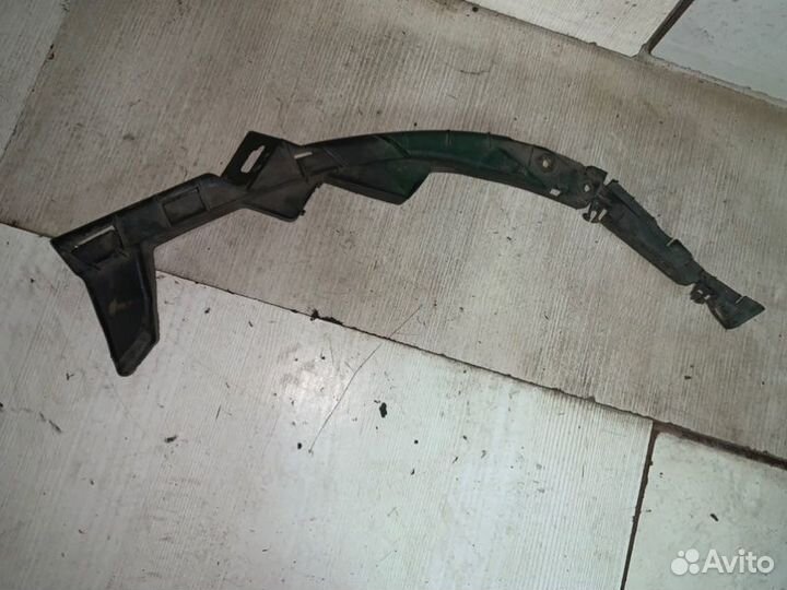 Крепление фары переднее Volkswagen Passat B5