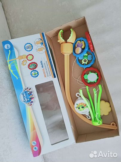 Детский мобиль в кроватку музыкальный