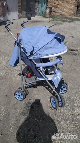 Прогулочная коляска трость