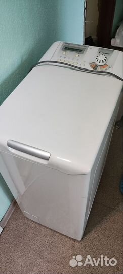 Стиральная машина автомат с вертикальной загрузкой