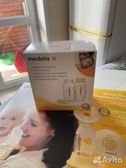 Молокоотсос medela swing электрический