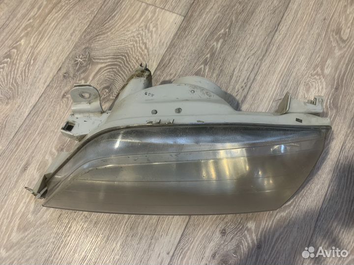 Фара левая toyota carina 210