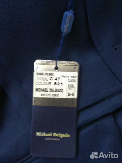 Продам новый костюм