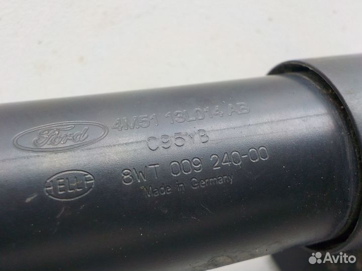 Форсунка омывателя фары на Ford Focus II