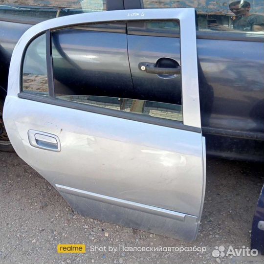 Дверь Opel Astra G