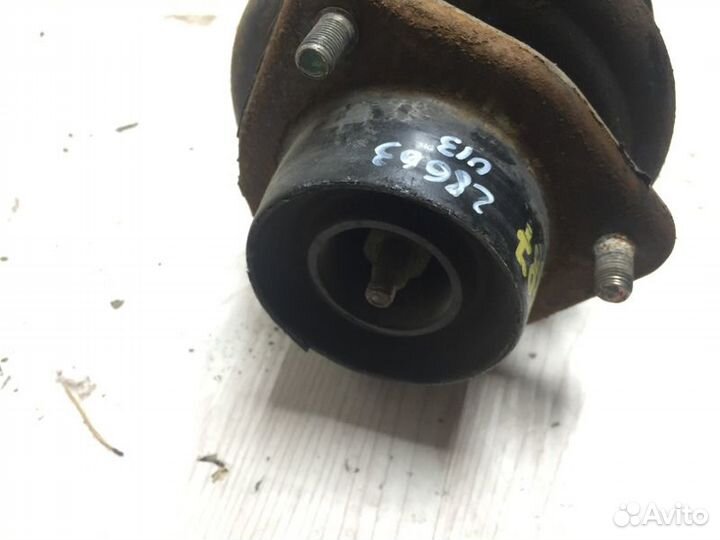 Амортизатор задний левый Nissan Bluebird U13 с1991