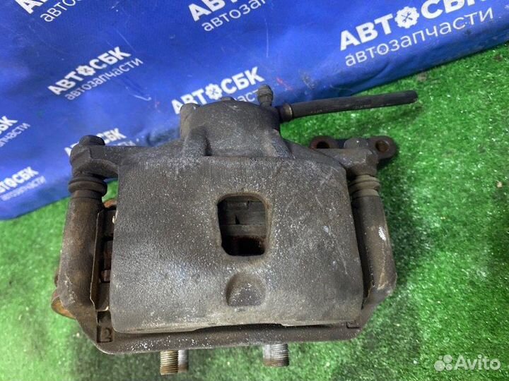 Суппорт передний левый Nissan Cube C11X CR14DE