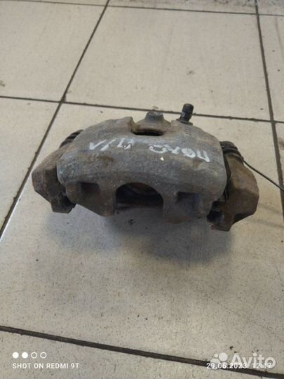 Суппорт тормозной передний левый Volkswagen Polo