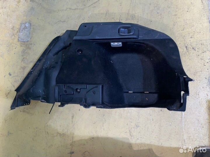 Обшивка багажника задняя правая Mitsubishi Lancer