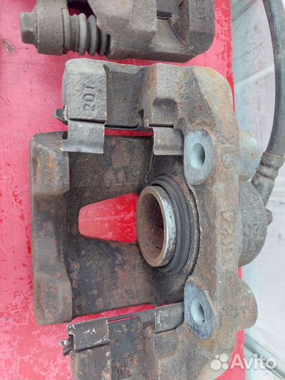 Суппорт передний правый левый Chevrolet Lanos