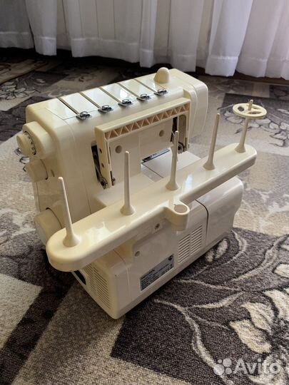 Оверлок merrylock 011