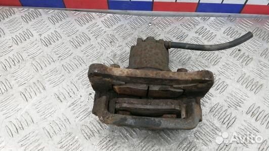 Суппорт тормозной задний левый mitsubishi pajero 4