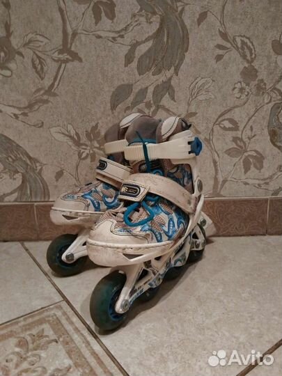 Роликовые коньки