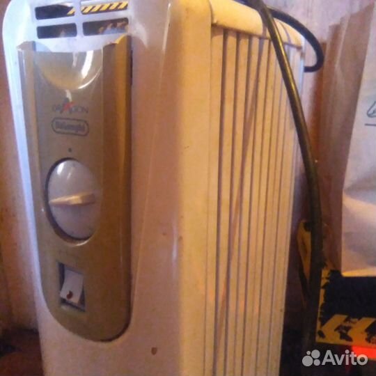 Масляный обогреватель delonghi