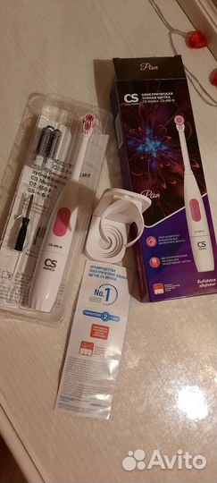 Электрическая зубная щетка