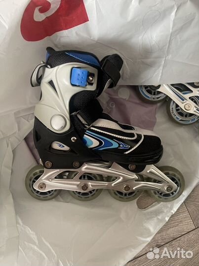 Роликовые коньки action