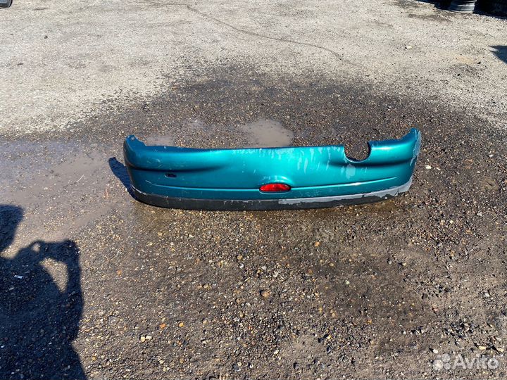 Бампер задний Peugeot 206 1999г. (хэтчбек)