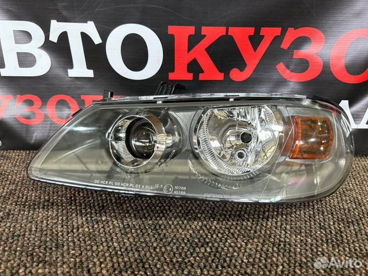 Фара левая Nissan Almera N16 2002-2006