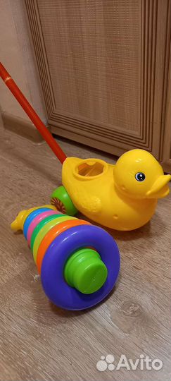 Развивающие игрушки каталка утка
