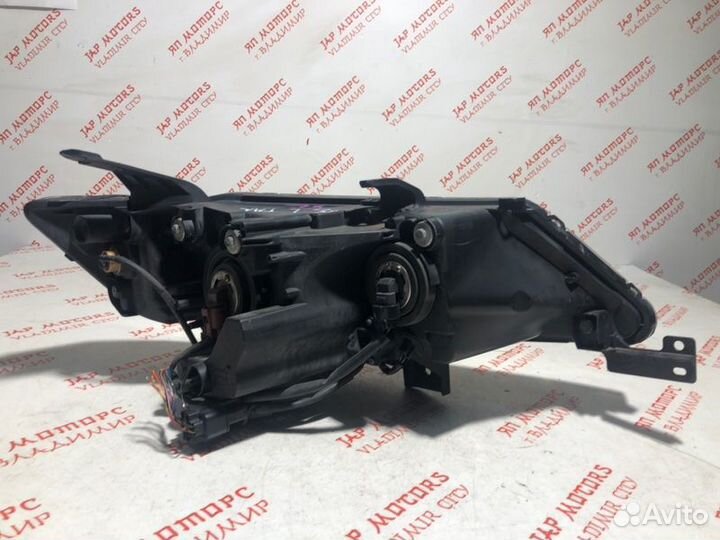 Фара галогеновая левая Mitsubishi Outlander XL