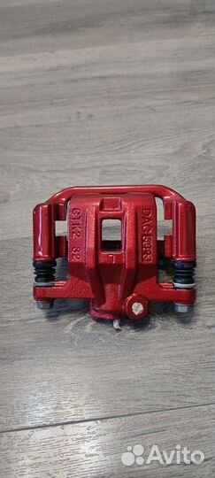 Задний левый суппорт Шевроле Лечетти