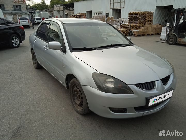 Mitsubishi Lancer 1.6 AT, 2004, 300 000 км