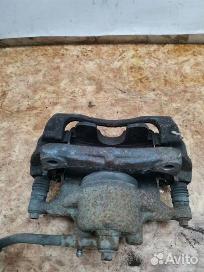 Суппорт тормозной передний правый Opel Astra J