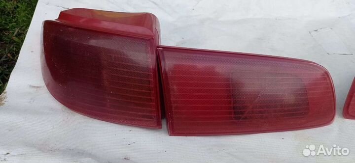 Задние стопы на Мазда Демио dy