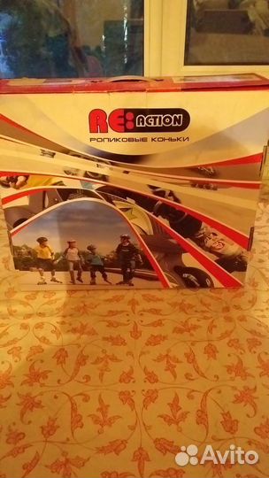 Роликовые коньки