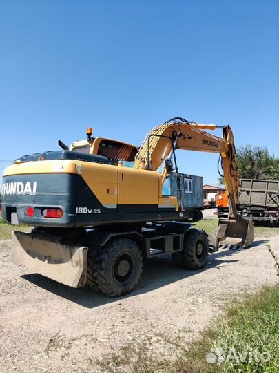 Колёсный экскаватор Hyundai R180W-9S, 2014