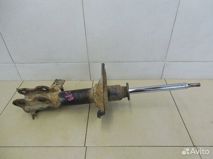 Амортизатор передний левый Almera Tino 2000-2006