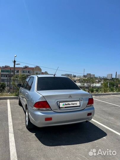 Mitsubishi Lancer 1.6 МТ, 2004, 200 000 км