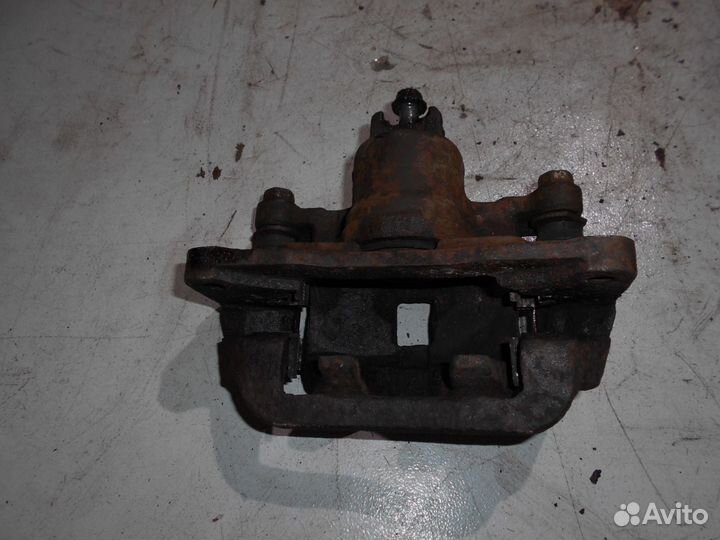 Суппорт задний тормозной Subaru Forester S10