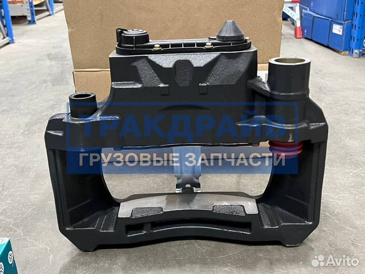 Суппорт Даф хф95 105 левый в сборе