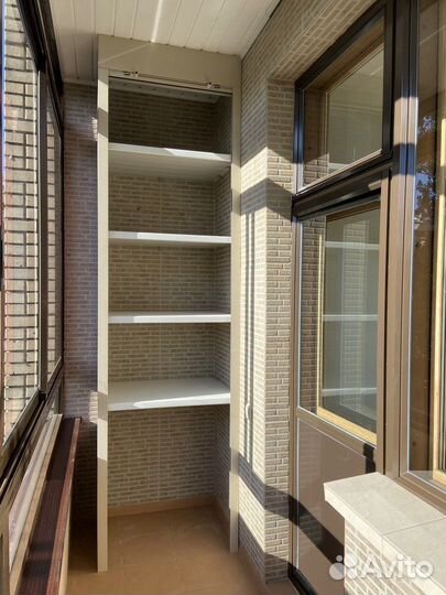 Шкаф с рольставнями на балкон на заказ