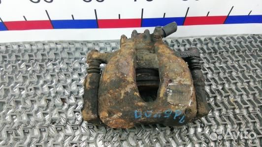 Суппорт тормозной передний левый peugeot 3008 (DOL