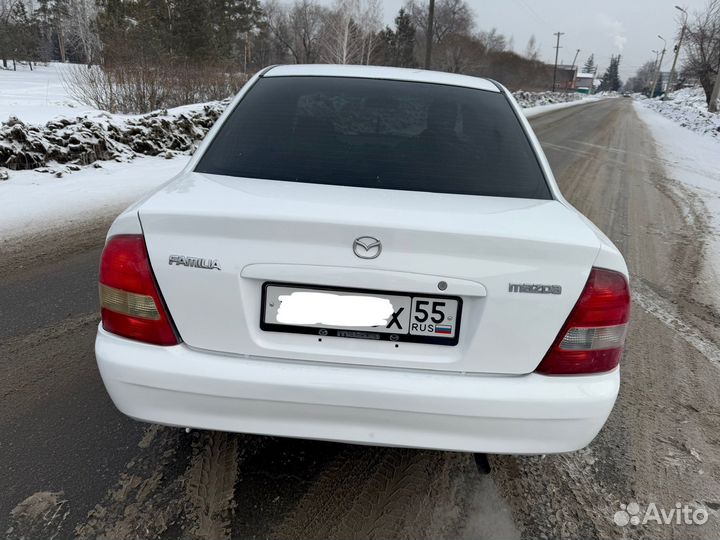 Mazda Familia 1.3 AT, 1999, 329 000 км