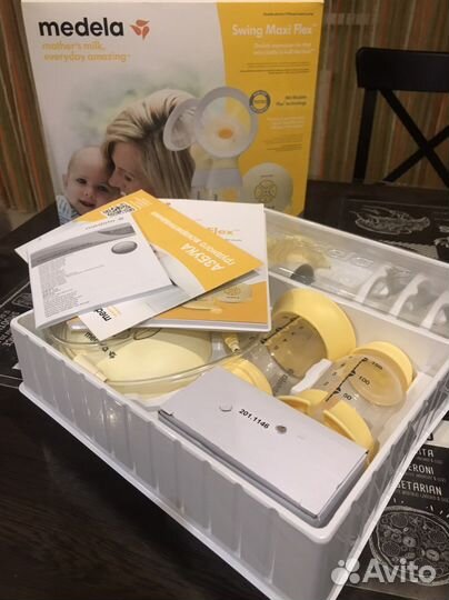 Молокоотсос medela swing flex электрический