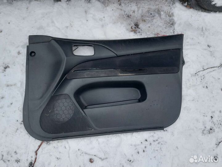 Обшивка двери передней правой Mitsubishi Lancer 9