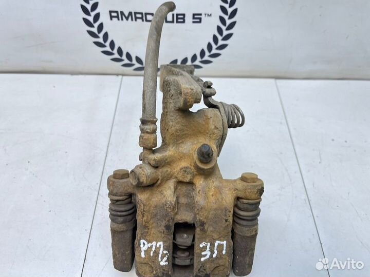 Суппорт задний правый Nissan Primera P11 1.6 GA16