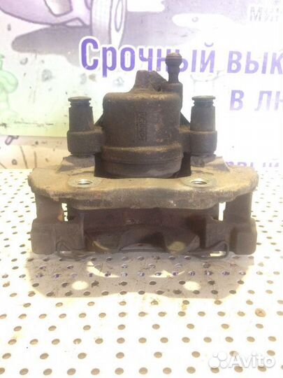 Суппорт тормозной передний правый Ford Focus