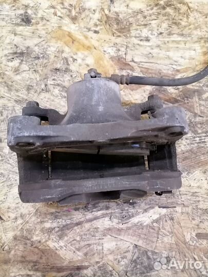 Суппорт тормозной передний Nissan Teana J32 4WD