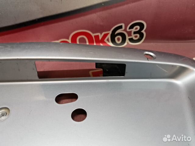 Накладка крышки багажника задняя Mitsubishi Lancer